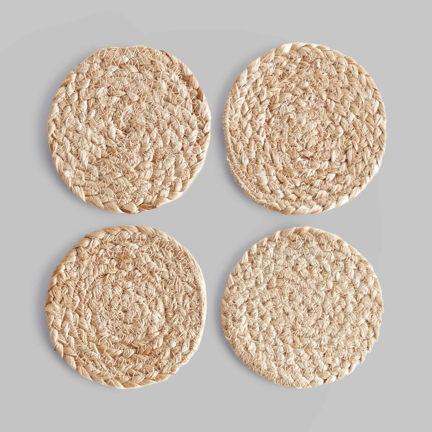 Natural jute coasters (set of 4) - stylish home accent (Image1).