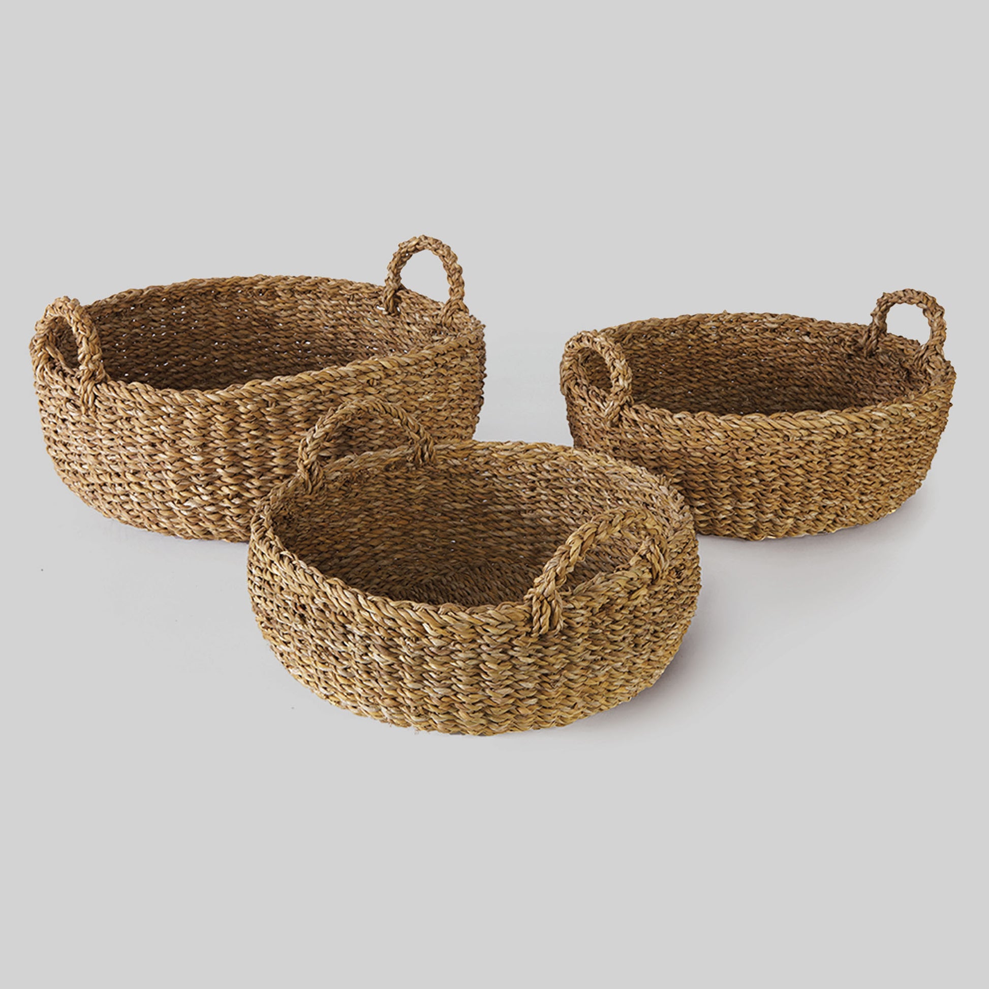 Natural seagrass shallow baskets with handles (set of 3) - stylish home accent (Image1).