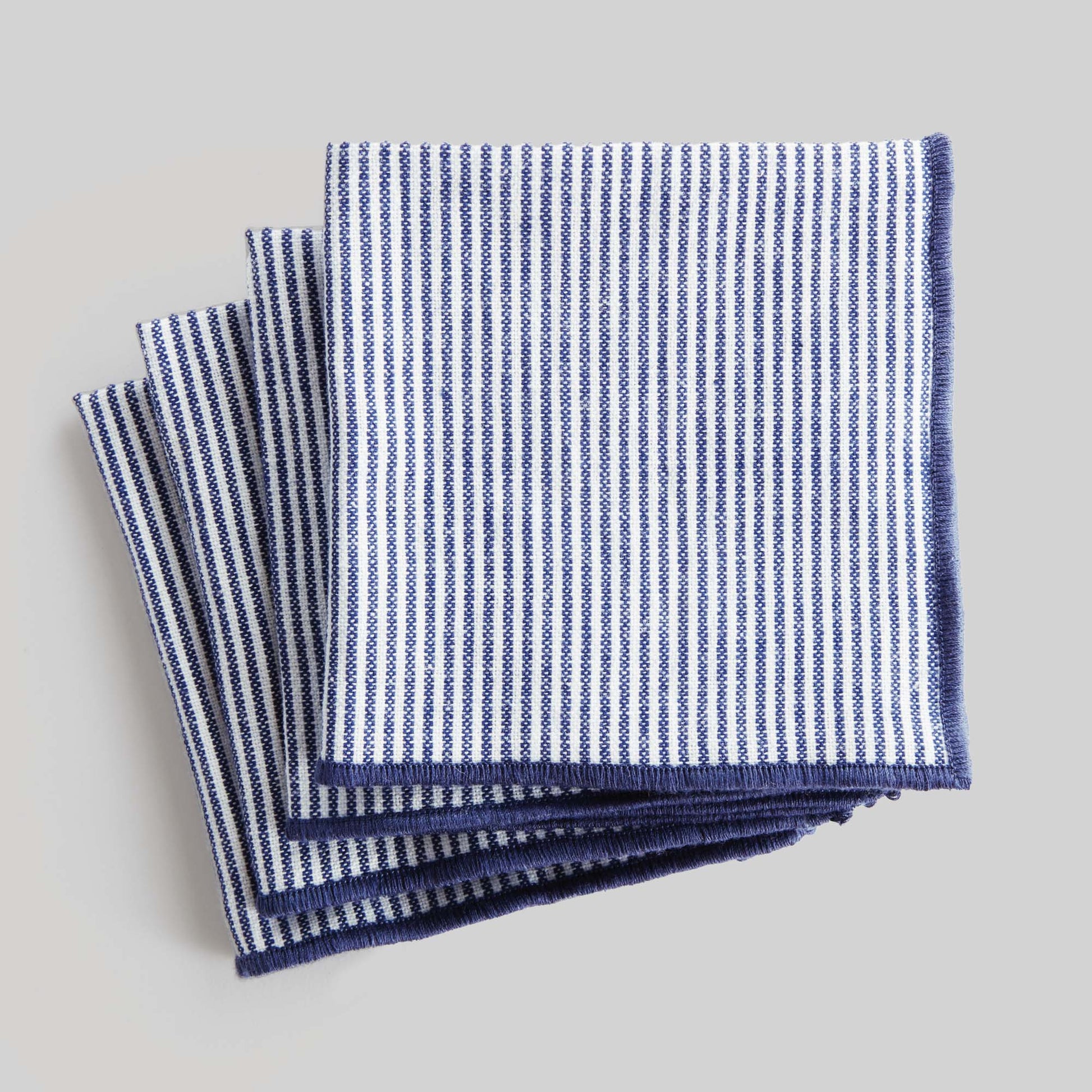 Navy blue and white pinstripe cotton cocktail napkins (set of 4) - stylish home accent (Image1).