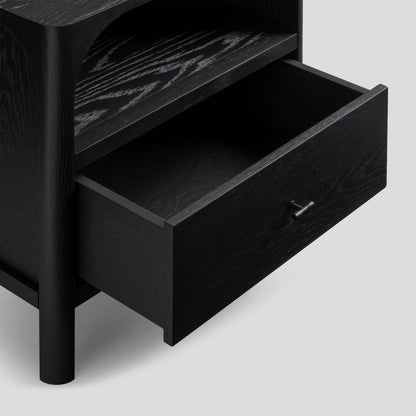 Black wooden nightstand with one drawer open on a light gray background