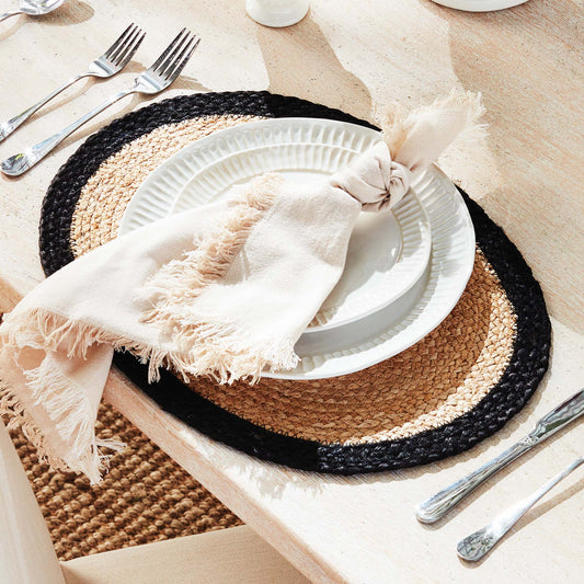 Oval jute placemats with black border (set of 8) - stylish home accent (Image1).