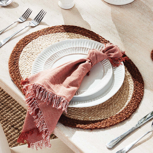 Oval jute placemats with brown border (set of 8) - stylish home accent (Image1).