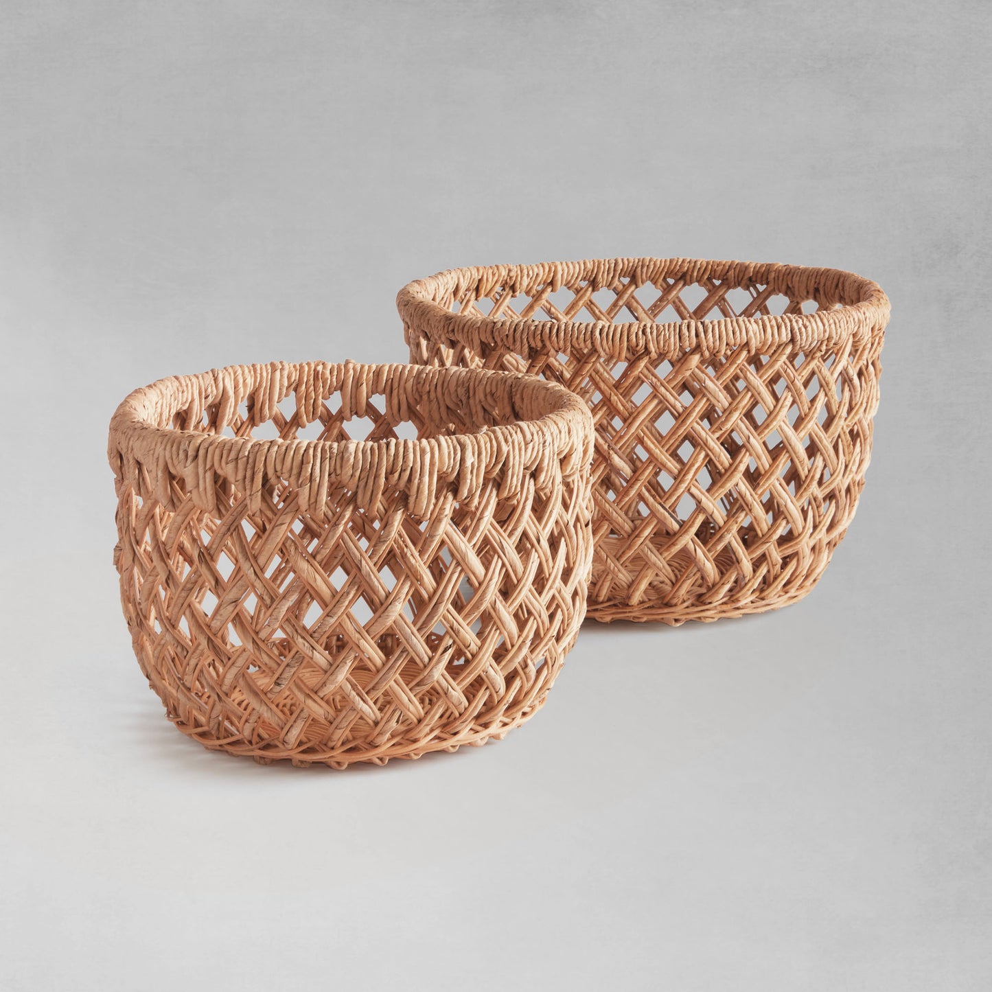 Oval woven banana leaf baskets (set of 2) - stylish home accent (Image1).