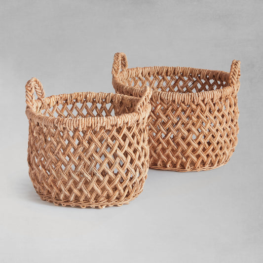 Oval woven banana leaf baskets with handles (set of 2) - stylish home accent (Image1).