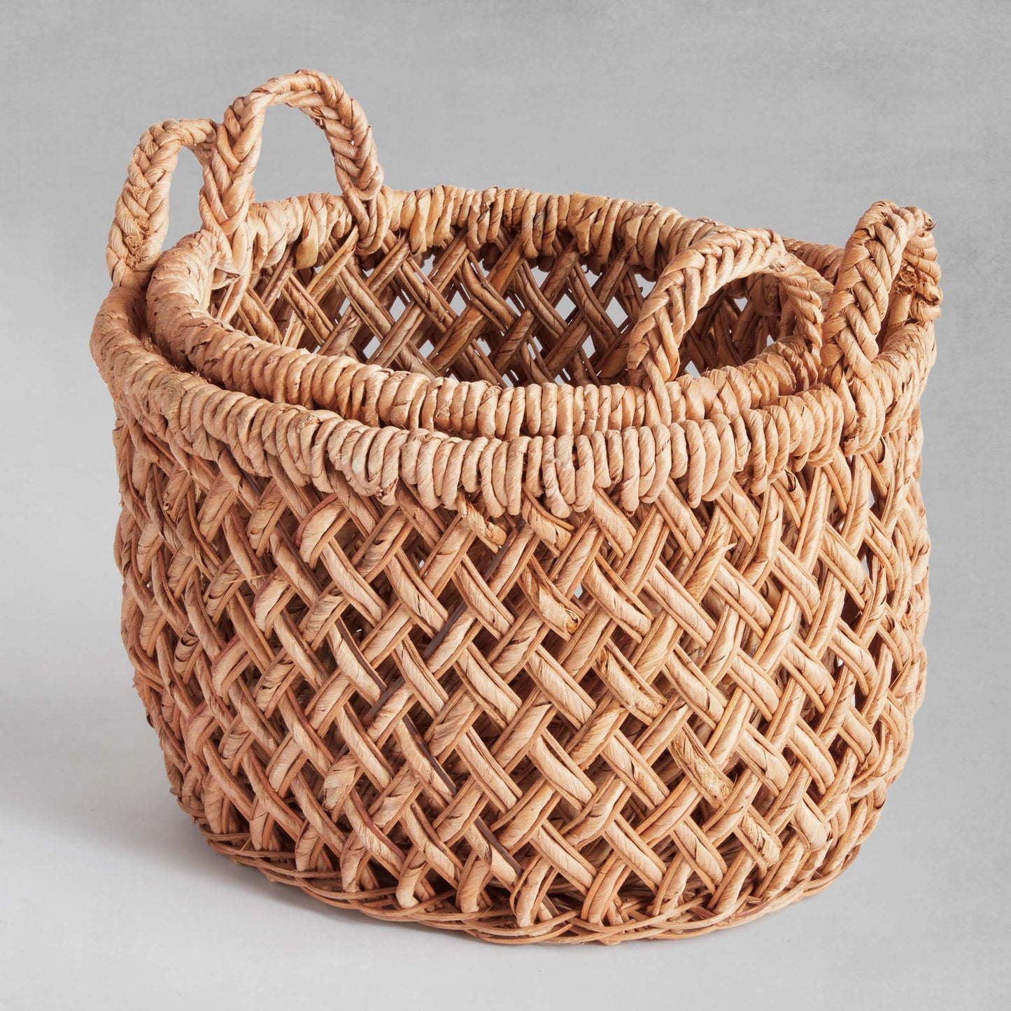 Oval woven banana leaf baskets with handles (set of 2) - stylish home accent (Image2).