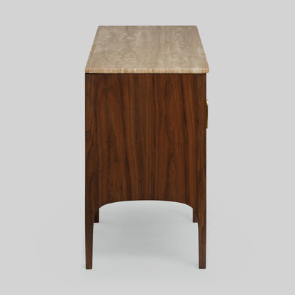 Wood sideboard with travertine stone top on light gray background.