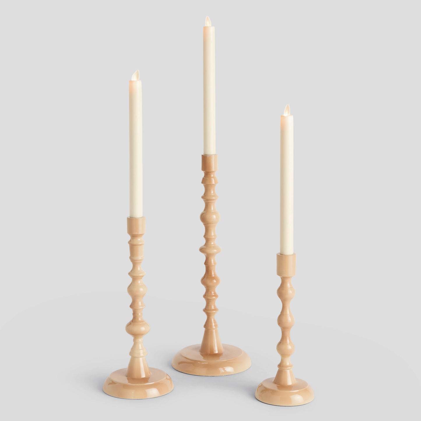 Pink enamel taper holders (set of 3) - stylish home accent (Image1).