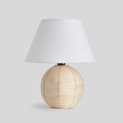 Rattan mini lamp with gray background.