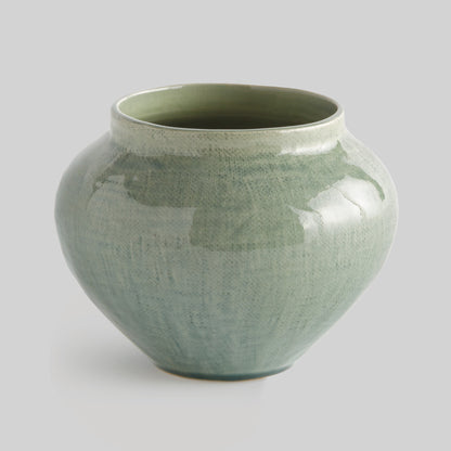 Sage green tapered ceramic pot - stylish home accent (Image1).