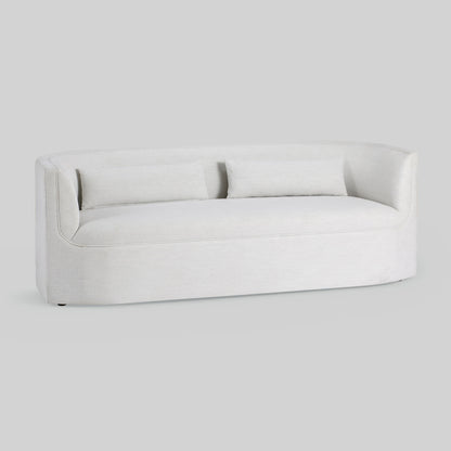 Light dove colored fabric sofa on gray background.