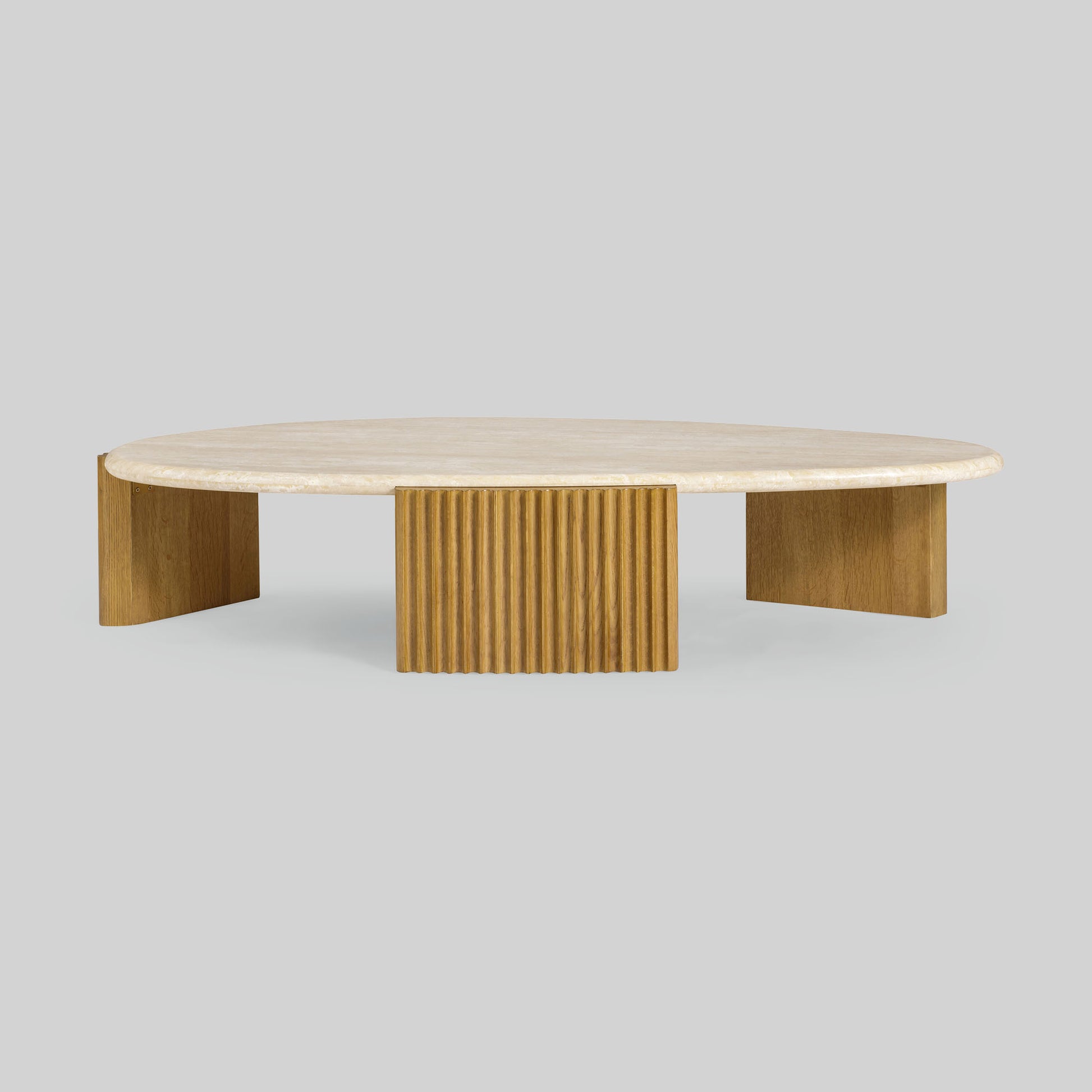 Contemporary light oak coffee table with marble top and wooden fluted base on a gray background.