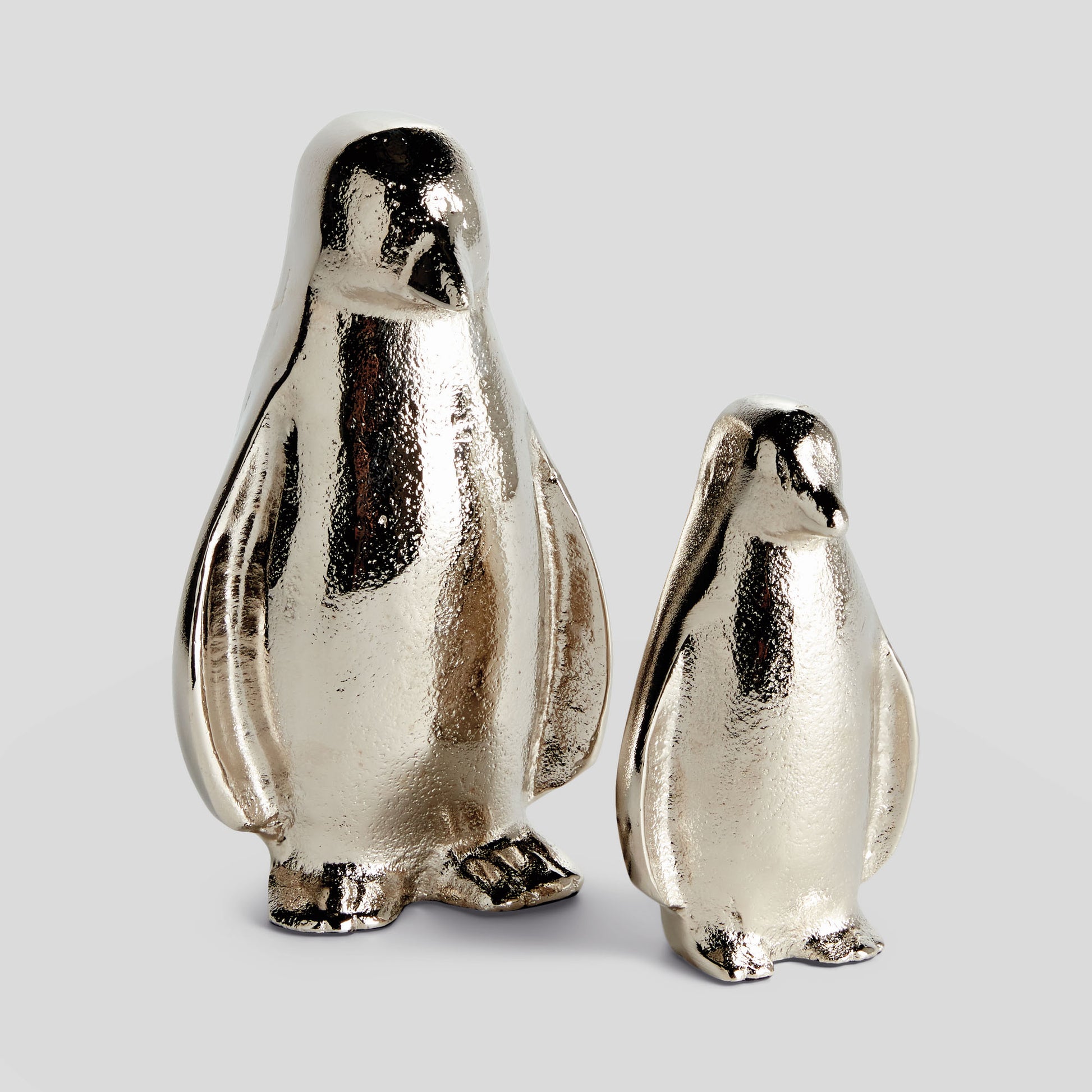 Silver aluminum penguin sculptures (set of 2) - stylish home accent (Image5).