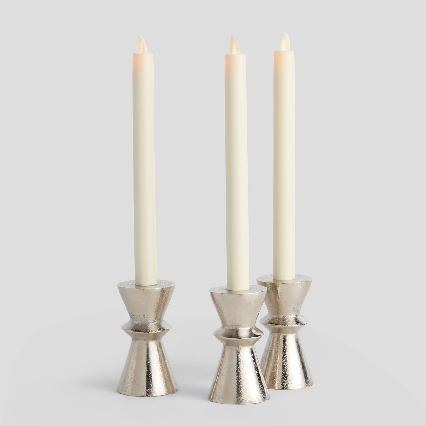 Silver aluminum taper candle holders (set of 3) - stylish home accent (Image1).