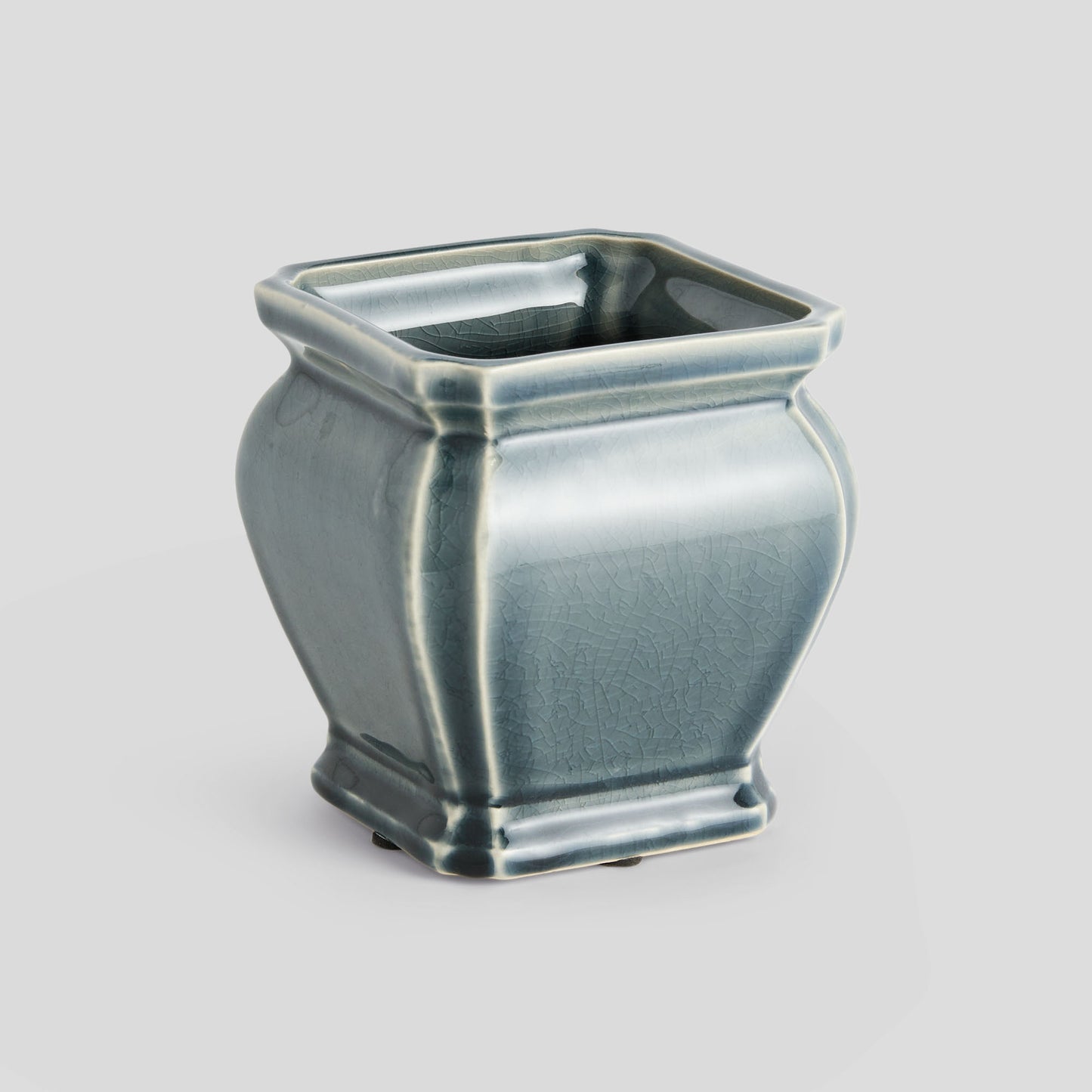 Small blue reactive glaze ceramic pot - stylish home accent (Image1).