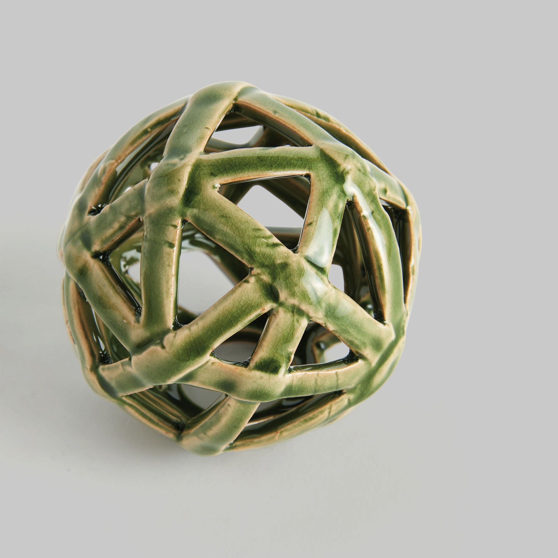 Small green reactive glaze ceramic orb - stylish home accent (Image3).