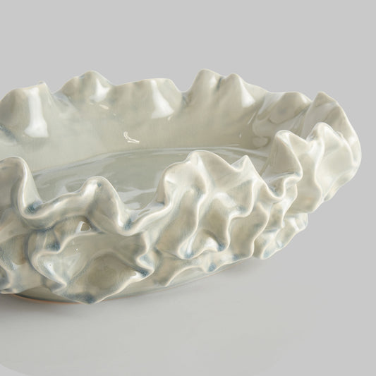 Small handcrafted stoneware decorative bowl - stylish home accent (Image1).
