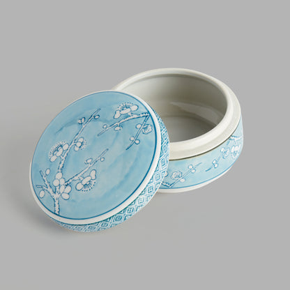 Small round light blue hand-painted porcelain lidded box - stylish home accent (Image2).