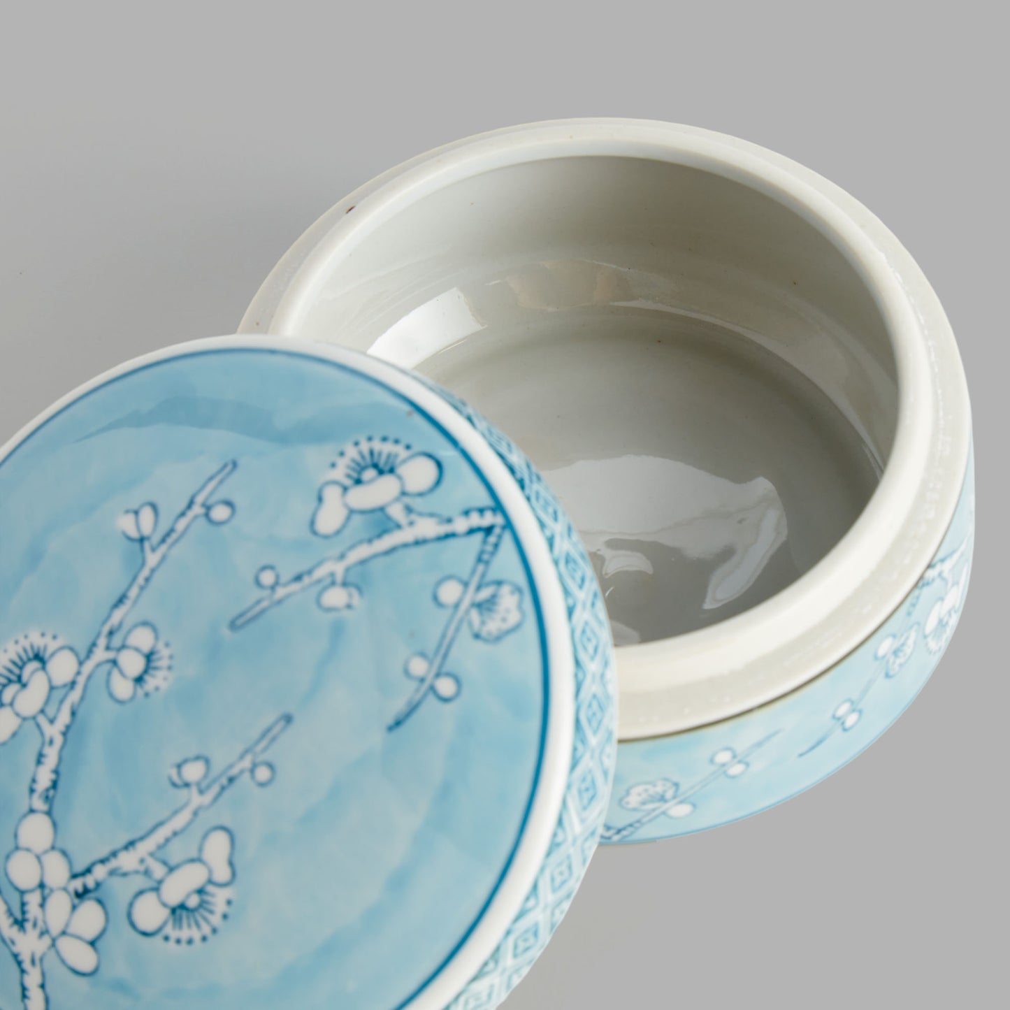 Small round light blue hand-painted porcelain lidded box - stylish home accent (Image3).