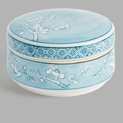 Small round light blue hand-painted porcelain lidded box - stylish home accent (Image4).