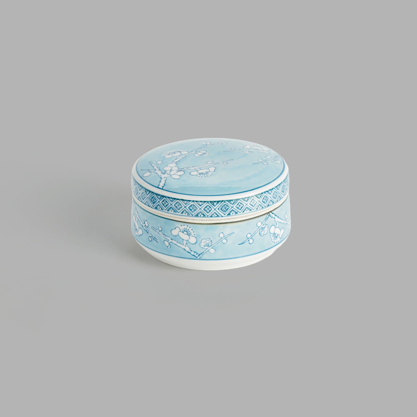 Small round light blue hand-painted porcelain lidded box - stylish home accent (Image6).