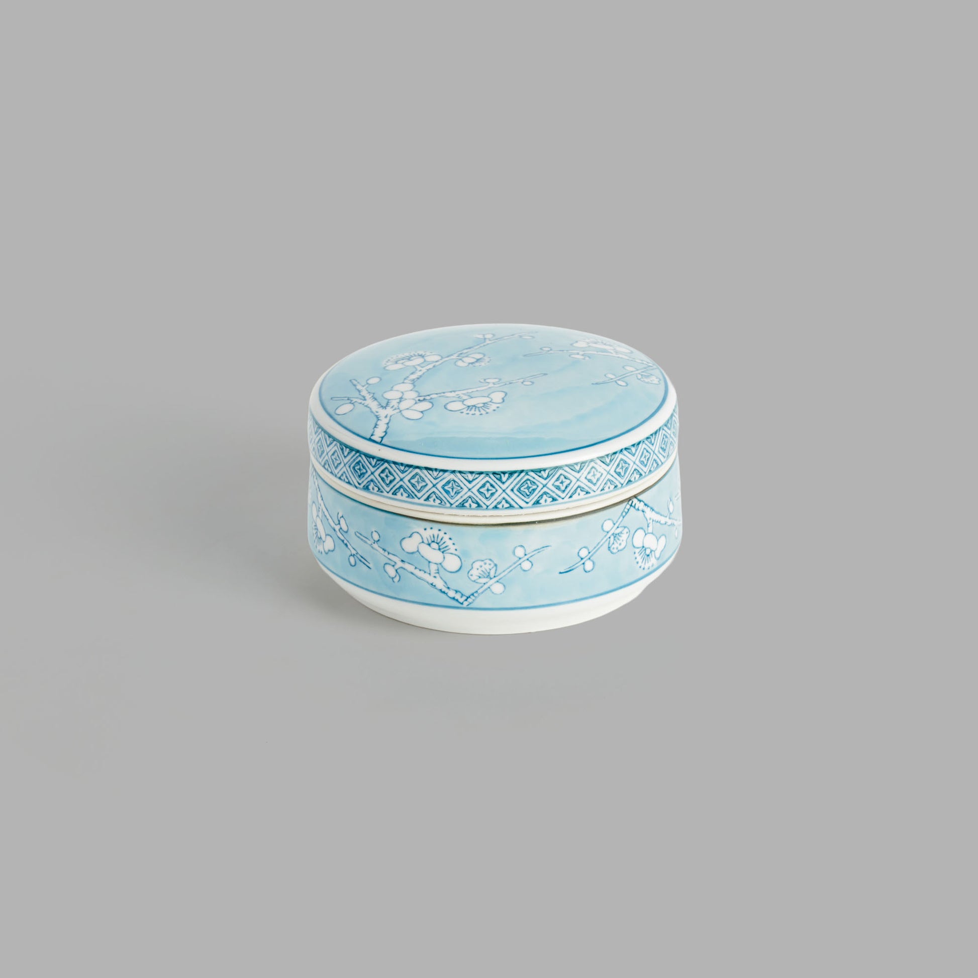 Small round light blue hand-painted porcelain lidded box - stylish home accent (Image6).
