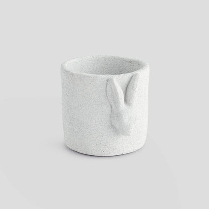 Small white concrete rabbit relief pot - stylish home accent (Image1).