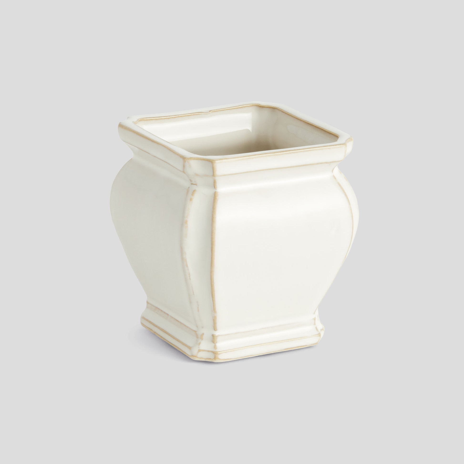 Small white glazed ceramic pot - stylish home accent (Image1).