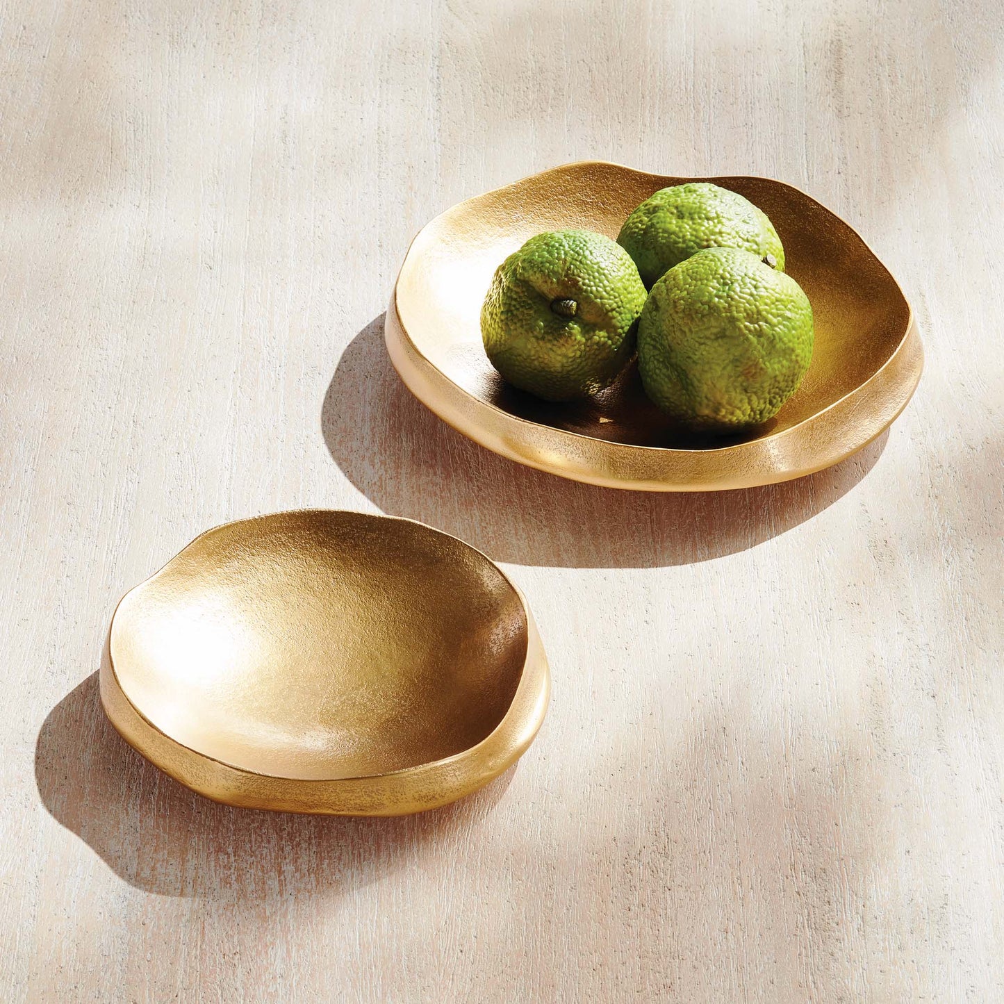Textured gold decorative round bowls (set of 2) - stylish home accent (Image1).