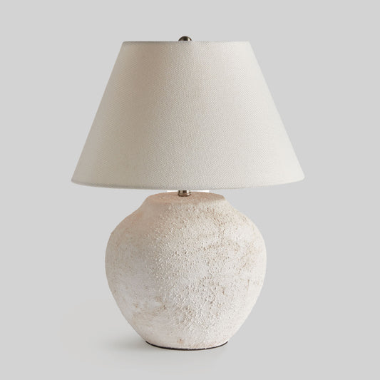 Textured white table lamp - stylish home accent (Image1).