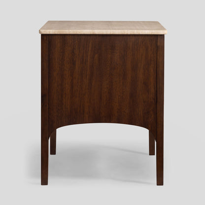 Wooden nightstand with travertine top on a light gray background