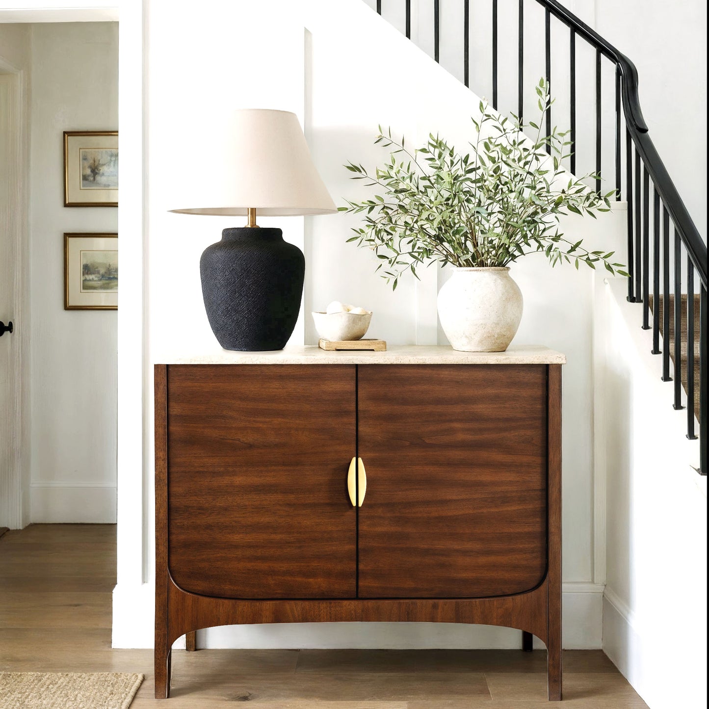 Wooden sideboard with decorative items in a home setting