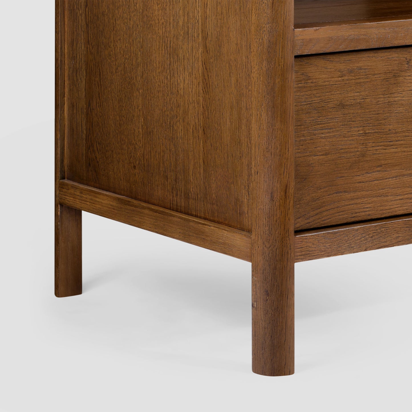 Wooden drawer unit with a white background