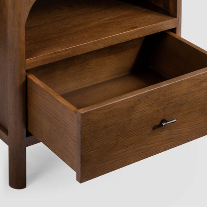 Wooden drawer with a metal handle on a white background