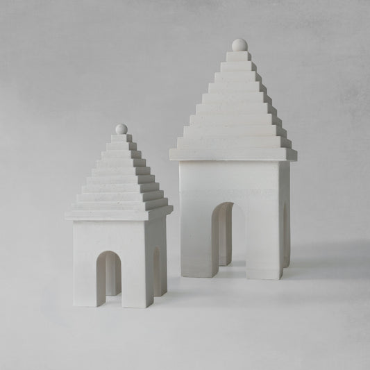 Weathered Bermudian buttery decorative objects with gray background.