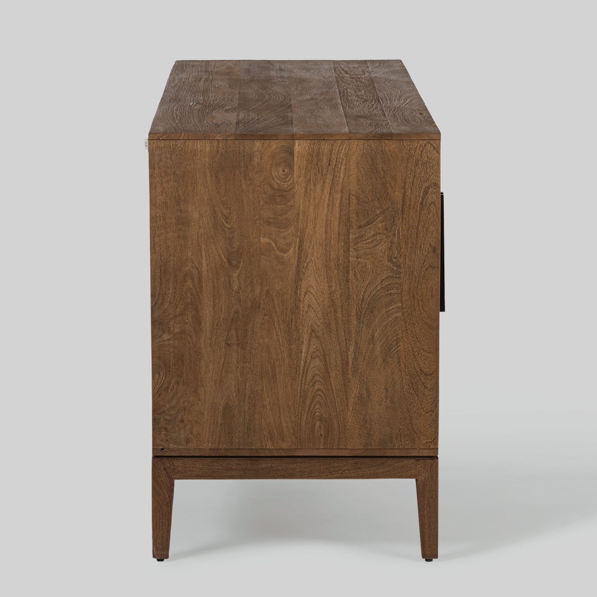 Wood sideboard with geometric pattern on a gray background.