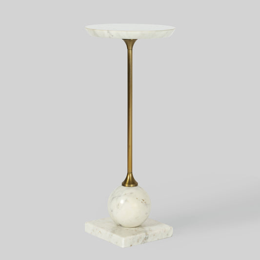 Small round cocktail table with marble top and base on a gray background.