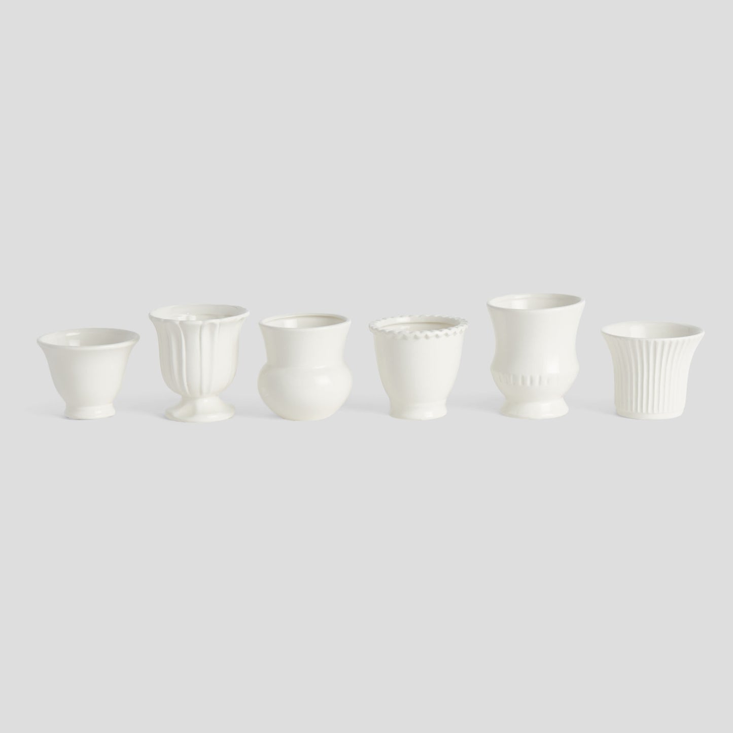 White ceramic mini cachepots (set of 6) - stylish home accent (Image1).