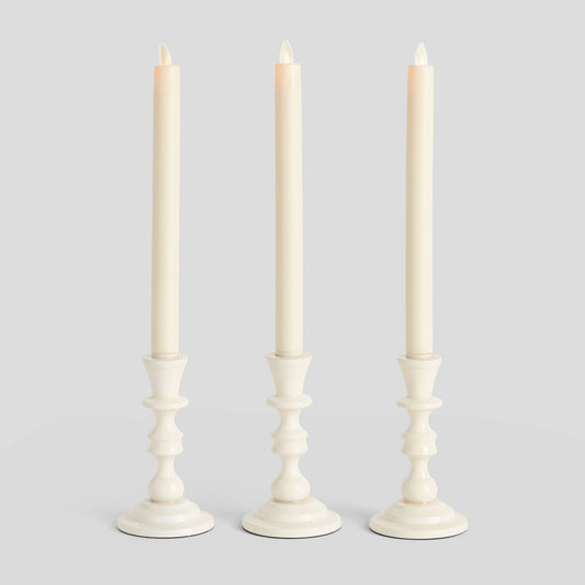 White enamel taper holders (set of 3) - stylish home accent (Image1).