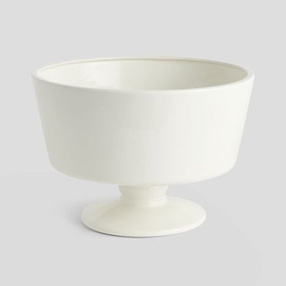 White handcrafted ceramic footed bowl - stylish home accent (Image1).