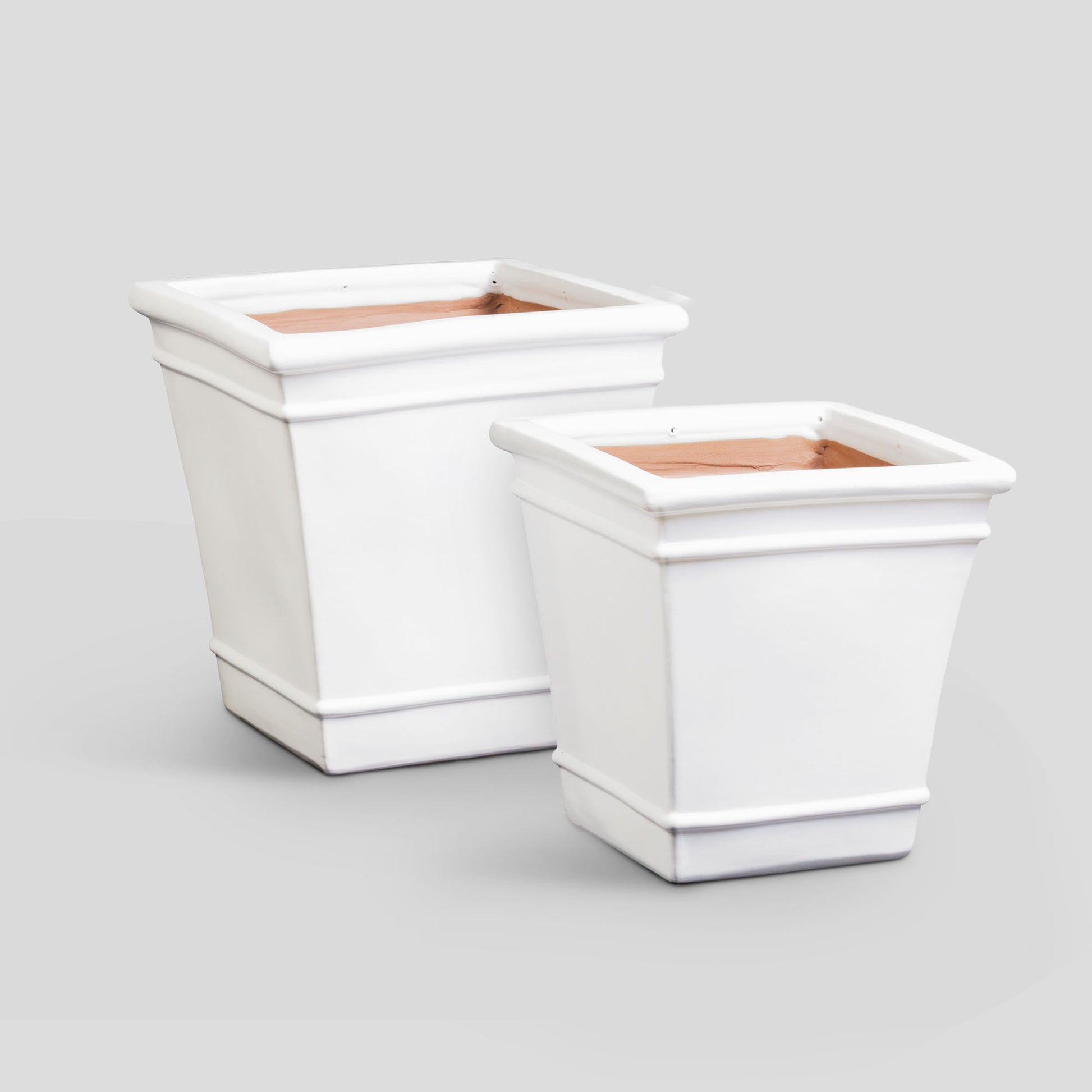 White reactive glaze ceramic pots (set of 2) - stylish home accent (Image1).