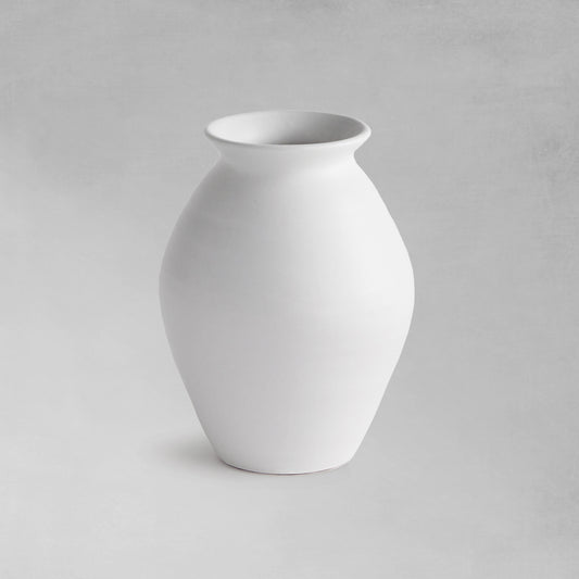 White terracotta wide-mouth vases, small, on a gray background.