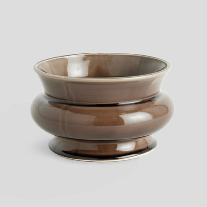 Wide brown reactive glaze ceramic pot - stylish home accent (Image1).