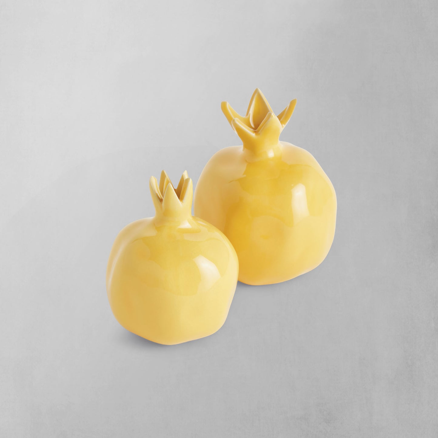 Yellow glazed ceramic bud vases (set of 2) - stylish home accent (Image1).