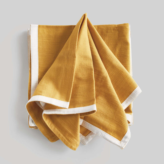 Yellow honey with white border cotton dinner napkins (set of 4) - stylish home accent (Image1).