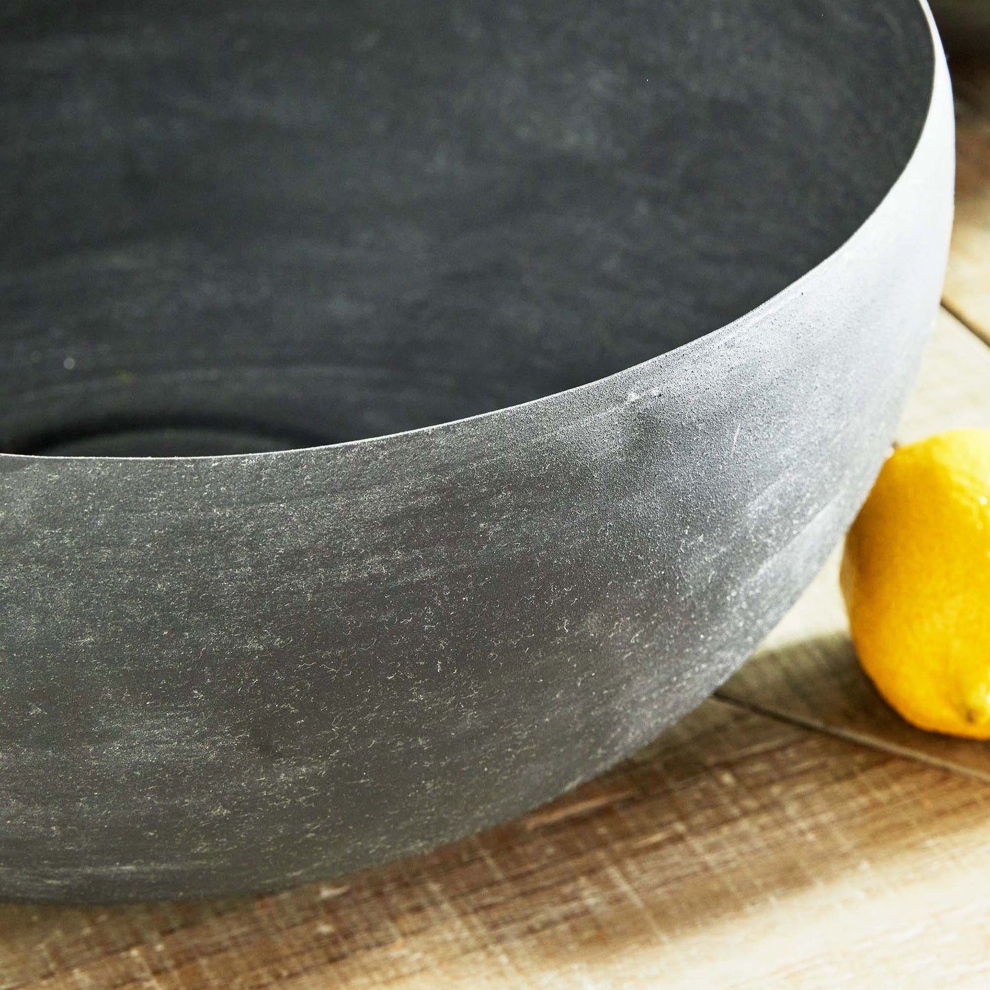 Zinc finish decorative metal bowls, set of two, closeup view of side of bowl.