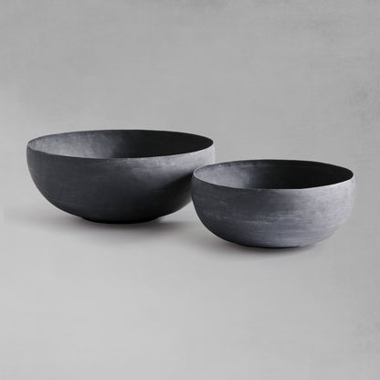 Zinc finish decorative metal bowls, set of two, with gray background.