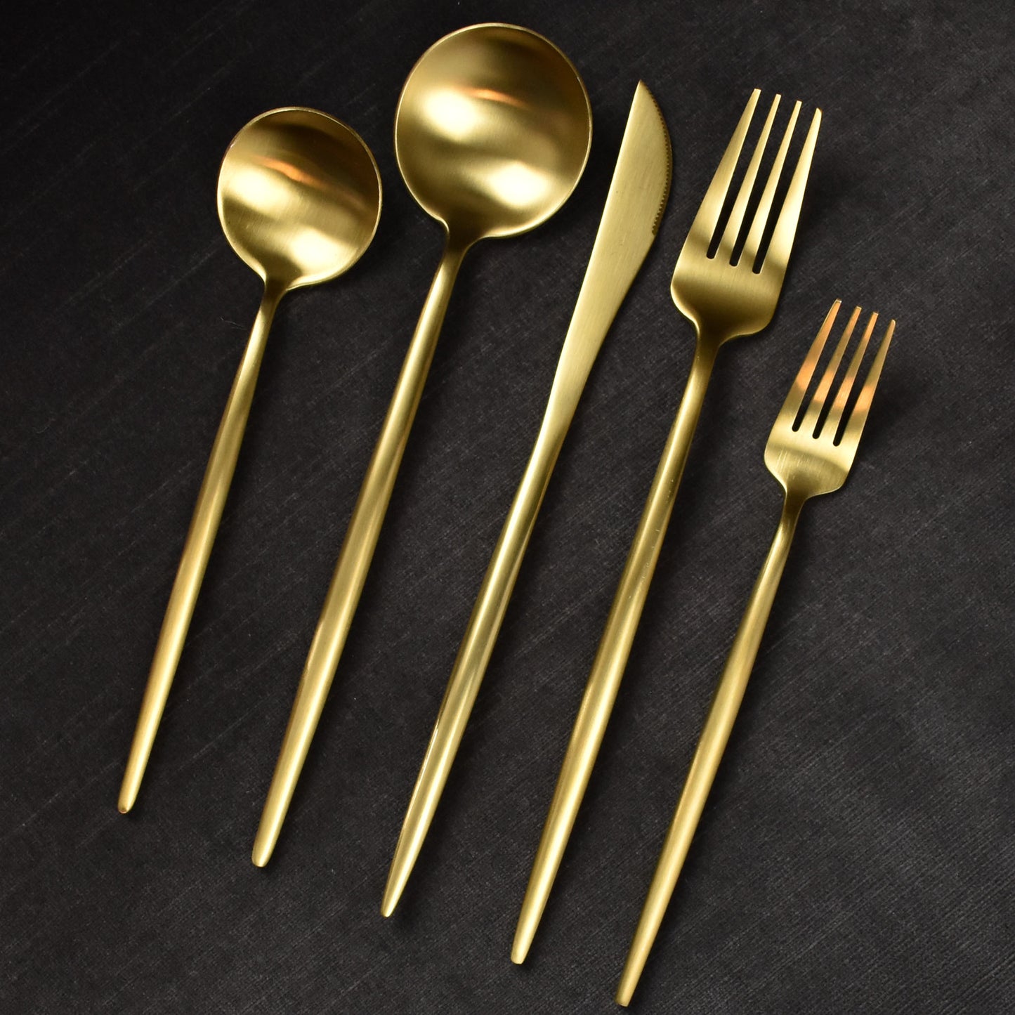 flatware set in brushed gold & black
